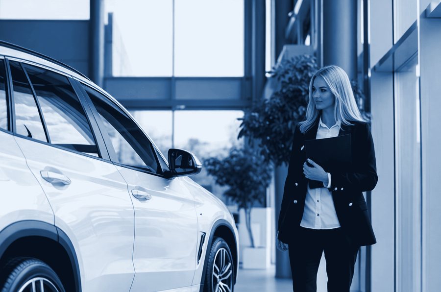 Woman with a clipboard next to a white SUV – car valuation